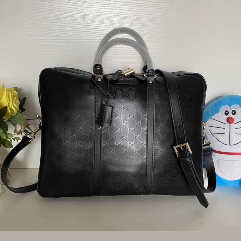 G*u*i top handle bags